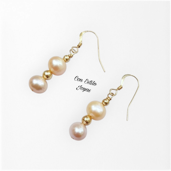 Aros perlas de río damasco y malva