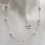 Collar perlas grises y blancas