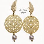 Aros mandala perlas blancas.