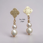 Aros flor perlas blancas.