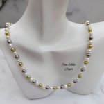 Collar perla Shell verde gris.